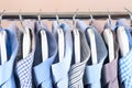Cloth Hangers with Shirts. Men`s clothes