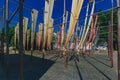 Cloth hanging over wooden poles in a square in the old town of Wuzhen, to showcase local textile dyeing techniques Royalty Free Stock Photo