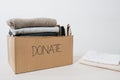 Clothes in box for concept donation and reuse recycle