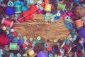 Clothes buttons on wooden baclground Royalty Free Stock Photo