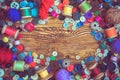 Clothes buttons on wooden baclground Royalty Free Stock Photo