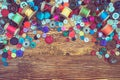 Clothes buttons on wooden baclground Royalty Free Stock Photo