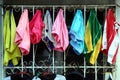 Clothes in a clothes line being hung to dry Royalty Free Stock Photo