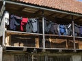 Clothes dries in a firewood barn, Kuldiga Old Town, Latvia