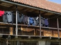 Clothes dries in a firewood barn, Kuldiga Old Town, Latvia