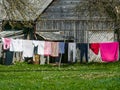 Clothes dries in the yard in sunny spring day