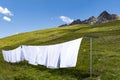 Clothes drying in a prairie of the alps Royalty Free Stock Photo