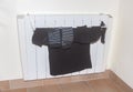 Clothes drying on the radiator Royalty Free Stock Photo