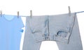 Clothes drying on washing line against white background Royalty Free Stock Photo