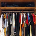 Clothes in full wardrobe Royalty Free Stock Photo