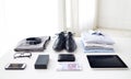 Clothes, gadgets and business stuff on table Royalty Free Stock Photo