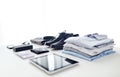 Clothes, gadgets and business stuff on table Royalty Free Stock Photo