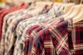 Clothes hang on a shelf . Cloth Hangers with Shirts. Men`s stylish clothes Royalty Free Stock Photo