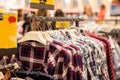 Clothes hang on a shelf . Cloth Hangers with Shirts. Men`s stylish clothes Royalty Free Stock Photo