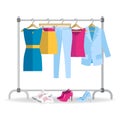 Clothes hanger with casual woman clothes, footwear