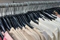 clothes on hangers in a fashion store, closeup of photo Royalty Free Stock Photo