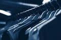 Clothes hangers in fashion store. Clothes business concept Royalty Free Stock Photo
