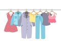 Clothes on hangers. Garment with hanger and rack in wardrobe. Shirt, dress and coat, jacket, pants. Apparel female