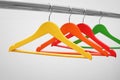 Clothes hangers on metal rail Royalty Free Stock Photo