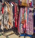 Clothes on hangers in a retail shop. Women clothing. Shop window with women clothing Royalty Free Stock Photo