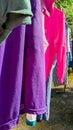 clothes hanging and dressed to dry outdoors on the clothesline Royalty Free Stock Photo