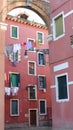 Clothes hanging between the houses in the Venetian streets Royalty Free Stock Photo