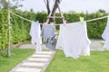 Clothes hanging laundry on washing line for drying against blue sky outdoor Royalty Free Stock Photo