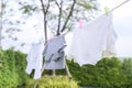 Clothes hanging laundry on washing line for drying against blue sky outdoor Royalty Free Stock Photo