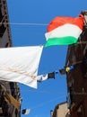 clothes hanging out drying in the sun in the narrow street of th Royalty Free Stock Photo