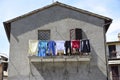 Clothes hanging out to dry on the balcony. Italy