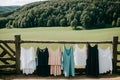 Clothes hanging out to dry on a fence. Royalty Free Stock Photo