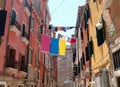 clothes hanging out to dry in a narrow Venice alley on a summer Royalty Free Stock Photo