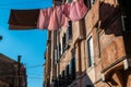 Clothes hanging out to dry on a traditional Venice street Royalty Free Stock Photo