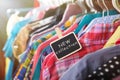 Clothes hanging on the rack in the store Royalty Free Stock Photo