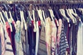 Clothes hanging on a rail Royalty Free Stock Photo