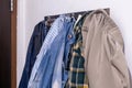 Clothes hanging on the wall at home Royalty Free Stock Photo