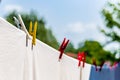 clothes hung out to dry with pegs