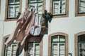 Clothes hung to dry in front of window on building Royalty Free Stock Photo