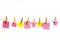 Clothes Line and Pins Holding Pink & Yellow Shapes for Text Royalty Free Stock Photo