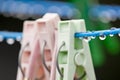 Clothes peg with water drops after rain Royalty Free Stock Photo