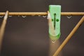 Clothes peg with water drops after rain Royalty Free Stock Photo