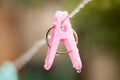Clothes peg with water drops after rain Royalty Free Stock Photo