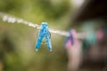 Clothes peg with water drops after rain Royalty Free Stock Photo