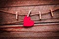 Old photo happy valentine`s day in love and clothes pegs background Royalty Free Stock Photo