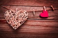 Old photo happy valentine`s day in love and clothes pegs background Royalty Free Stock Photo