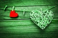 Old photo happy valentine`s day in love and clothes pegs background Royalty Free Stock Photo