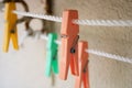 Clothes pegs on a rope