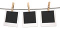 Clothes pin and three blank photo papers hanging on rope 3D Royalty Free Stock Photo