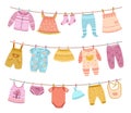 Clothes on ropes. Clothesline, kids cloth dry on lines. Children skirt socks shirt, isolated cartoon clean baby apparel