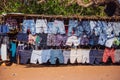Clothes for sale along roadside in Pemba
